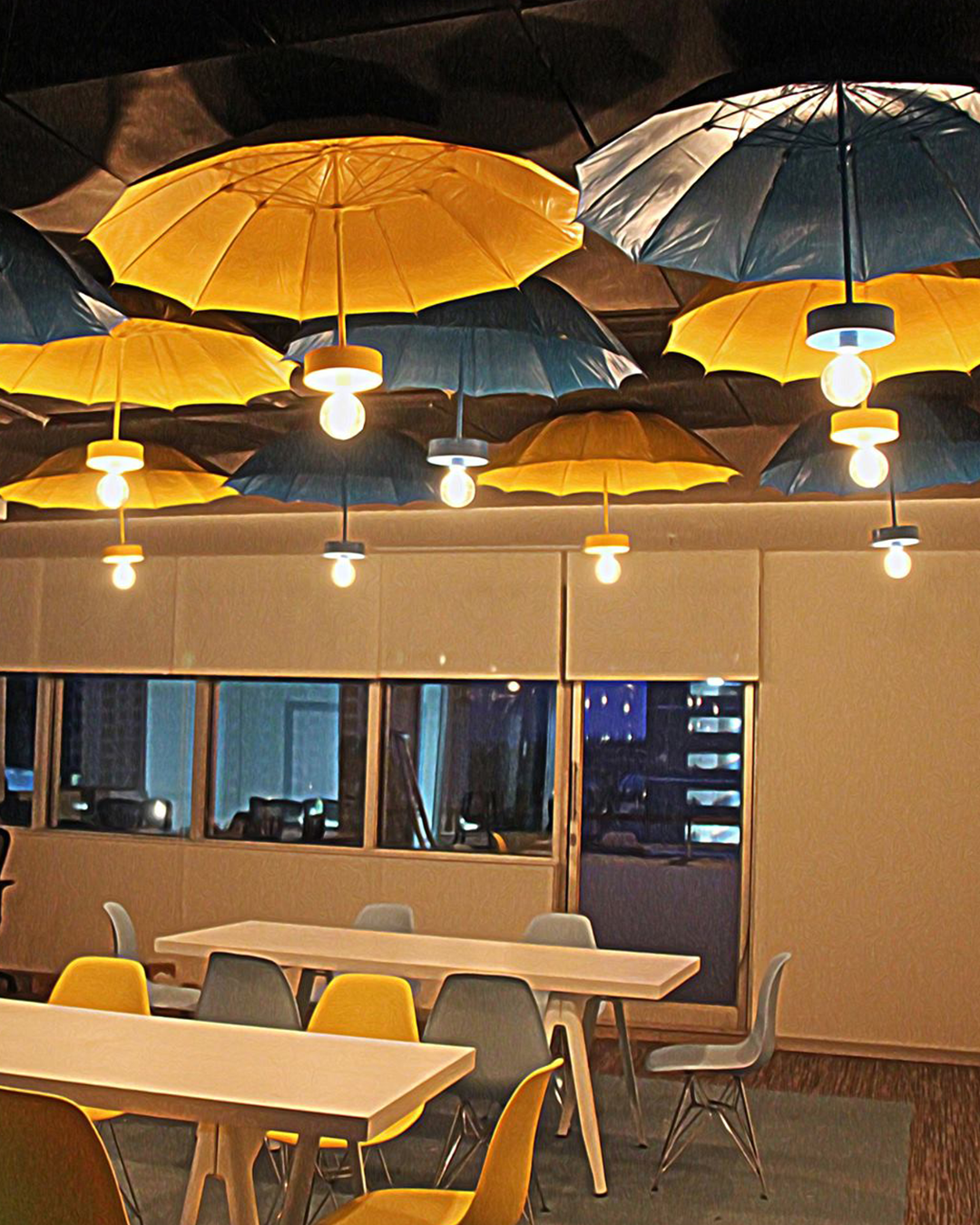 Office room interior design by JUMPINGGOOSE, highlighting a playful office space interior using suspended umbrella lights and flexible seating design.